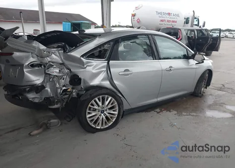 2017 Ford Focus Titanium z USA, uszkodzony, nr VIN 1FADP3J23HL291611